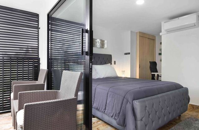 One Bedroom Balcony AC hot tub apartment with part time security