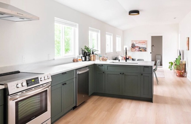 Oodles of light in modern home by historic Manito