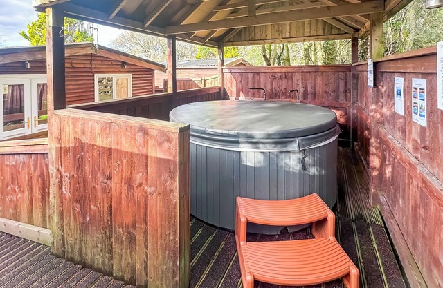 Open plan lodge with two doubles, both with TV/DVD.