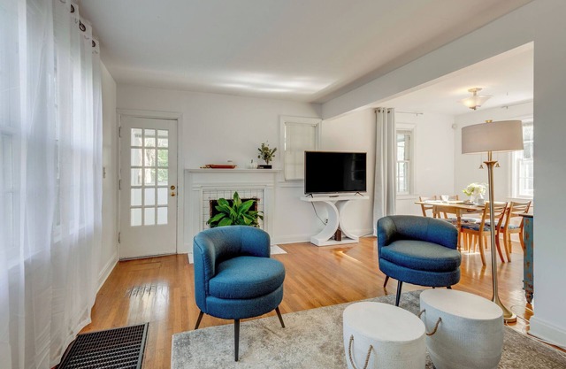 Our cozy stone cottage is a wonderful home in a beautiful neighborhood filled with mature trees