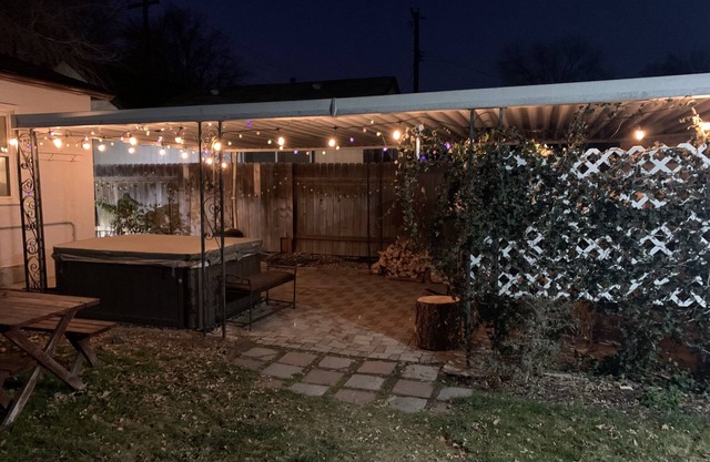 Outdoor fireplace, hot tub, coffee bar. Close to green belt and downtown