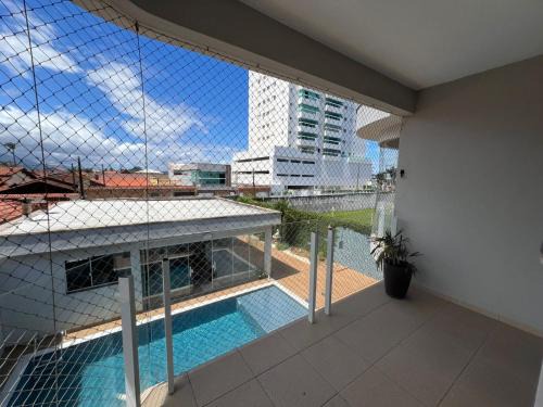 Pé na areia à 50m da Praia com Piscina, Churrasqueira, 5 quartos e 3 Vg de garagem,