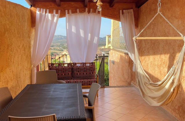 Panoramic, spacious with terrace and two gardens, walking distance to the beach