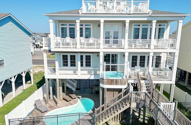 "Peaceful Breezy Feelin" is a 6 Bedroom, 6.5 Bathroom Oceanfront Home w/Private Pool, Elevator!