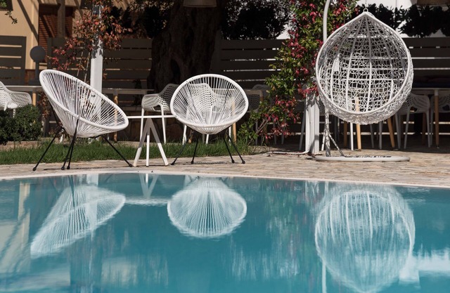 Peaceful complex with swimming pool near the beach in relaxing surroundings