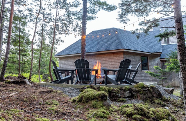 Peaceful private woodland home, open and airy, with ocean views and fire pit