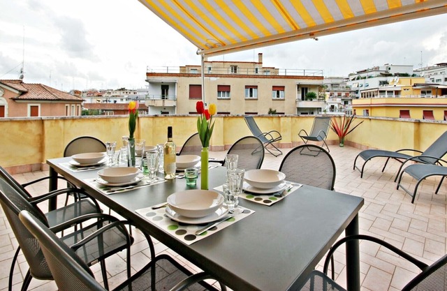 Penthouse with large terrace overlooking Rome