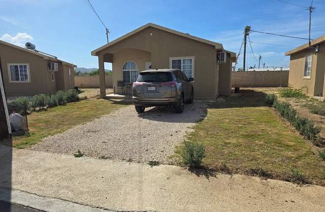Phoenix Rising Superb bungalow with AC in Portmore - 2 bedrooms