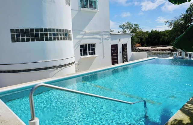 Poolside Sea View Studio w Pool & Deck by Airport
