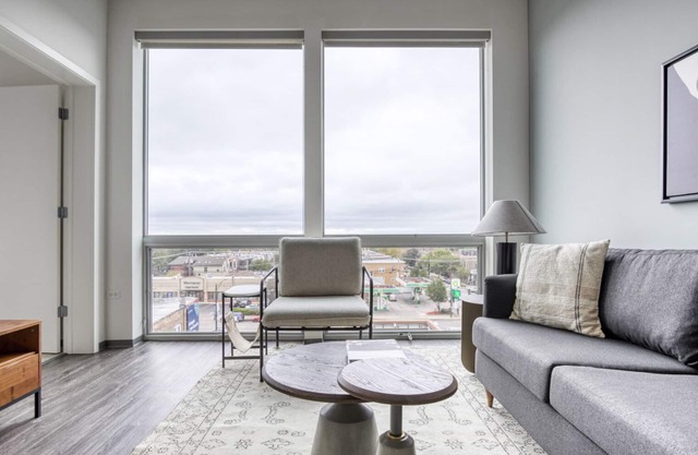 Premium Logan Square 1BR w/Roof Deck & Gym, 1 block to L, by Blueground