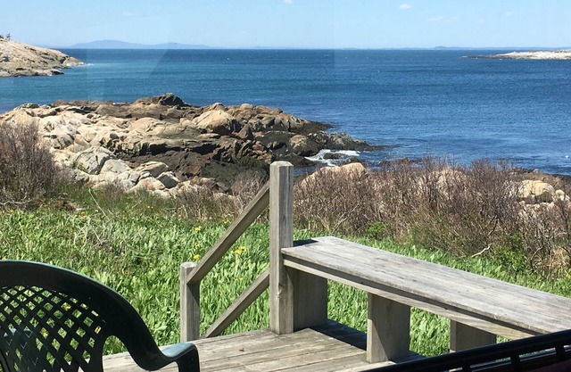 Private setting at ocean's edge and next to sandy beach