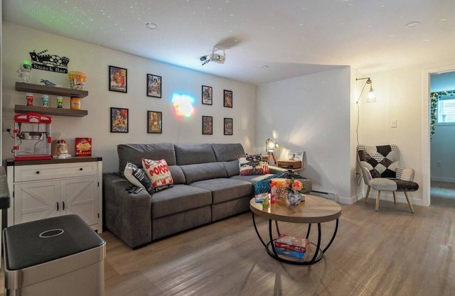 Private theatre, themed rooms, and comfort near Whyte Ave & Downtown