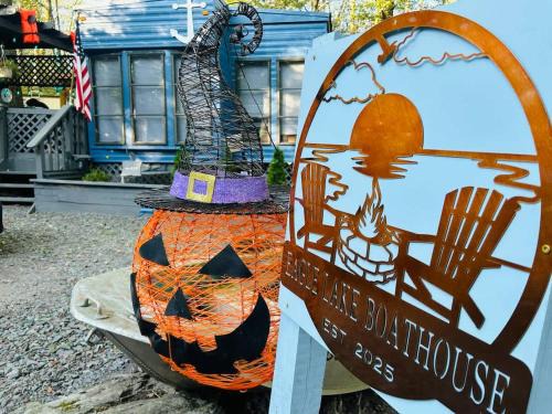 pumpkin filled tiny boat house for the fall