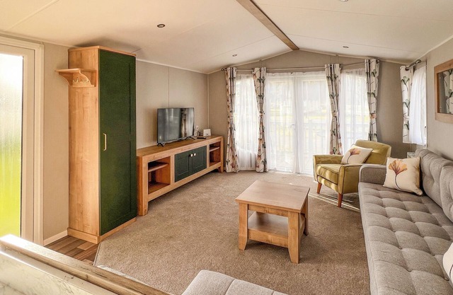 Quality 12ft-wide caravan with one double and one twin.