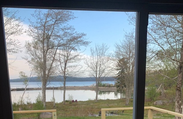 Quiet Coastal getaway nestled in the trees behind a lobster pound.