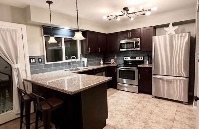 Rare 4 Bedroom Townhome with Backyard in Tempe