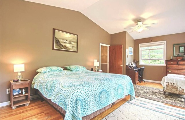 Rare mountain getaway 50 acres, stocked trout pond & river in Hendersonville NC