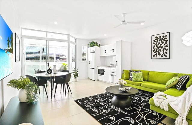 Reefside at 201 Lake Street- Stylish City Apartment with Pool & Balcony Near Esplanade