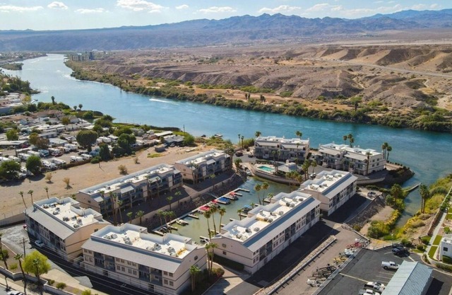 Relax on this beautiful River Front Get Away! Centrally located Unique Property