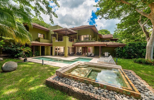 Relax poolside in the renewed Carao Villa 5