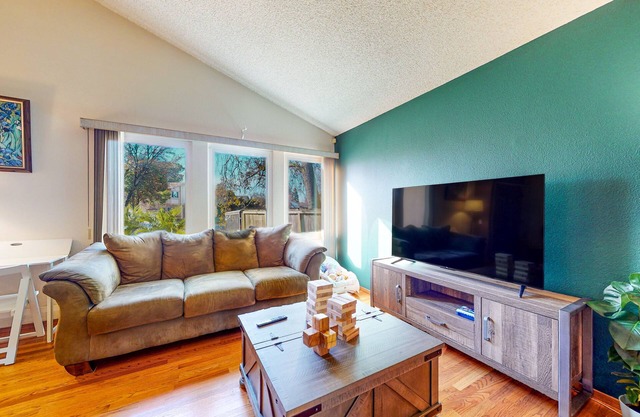 Renovated home with private seasonal pool, wood fireplace, patio, & washer/dryer