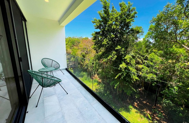 Resort-Style Apartment with Terrace, Pool and Nature in Puerto Aventuras