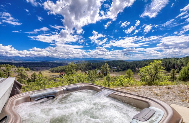 Retro-Modern, Mountain Retreat with 3 bedrooms, 2 baths, a bonus game room, office, and a beautiful deck with ample seating for enjoying the Stunning Mountain Peak Views. Best Views in town. Permit VRP-25-0317 Maximum Guest: 6