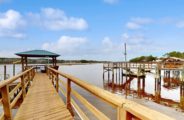 Riverview Wonders | Waterfront house in Shallotte with balcony & river views