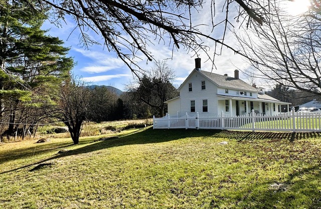 Rocky Branch Retreat on 33 acres with fenced yard, fireplaces & deck