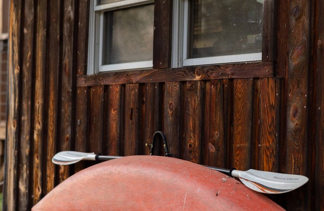 Rustic cabin w/29 acres. Enjoy a hot tub, wood stove, nature trails and more.