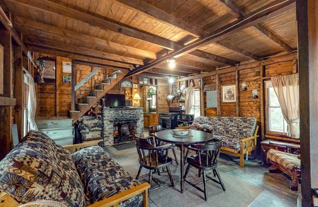 Rustic, lakefront fishing cabin on Webber Pond with sunset views - 2 dogs OK