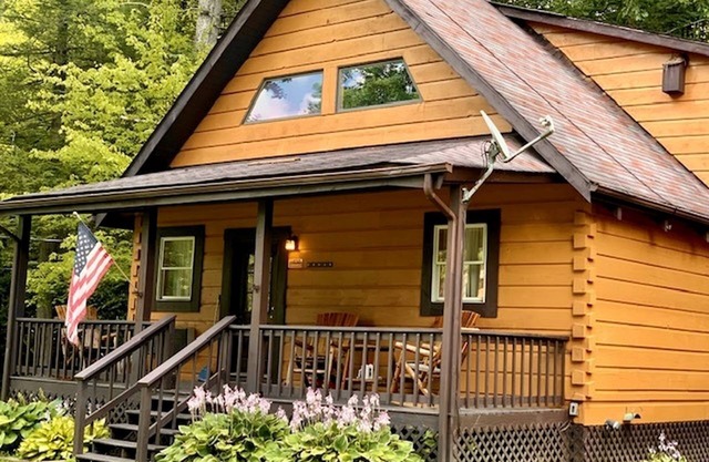 Rustic Wooden Cabin Settled Between Trees in Monterville, West Virginia