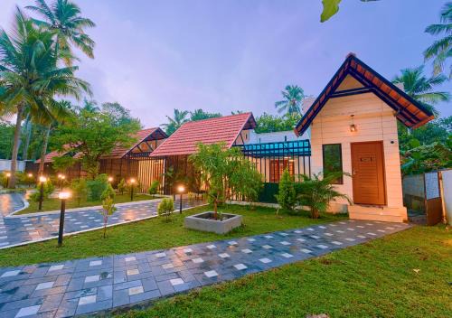 Sarang Resort Varkala by VOYE HOMES - Includes Rooms with Private Pool