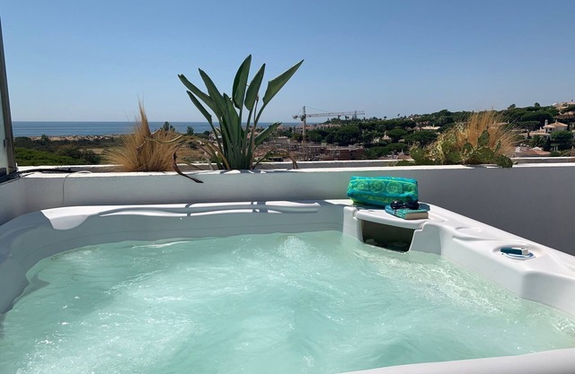 Sea view duplex two bed apartment just minutes from the beach, private jacuzzi.