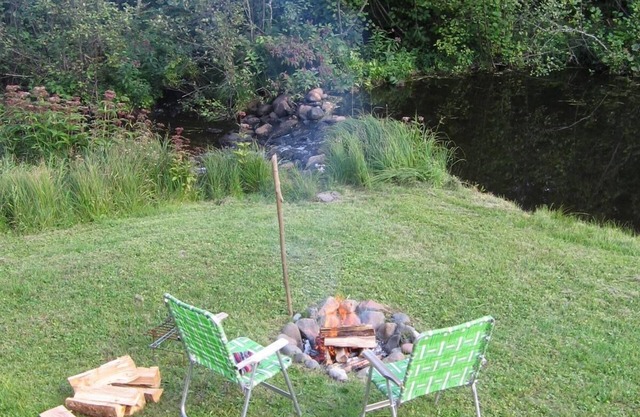 Secluded Forest Retreat With The Little Devil Track River Running Through.
