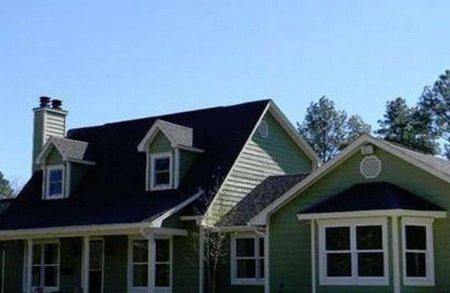 Secluded Private 4-bedroom house with WiFi, AC pool/hot tub/bar Gulfport