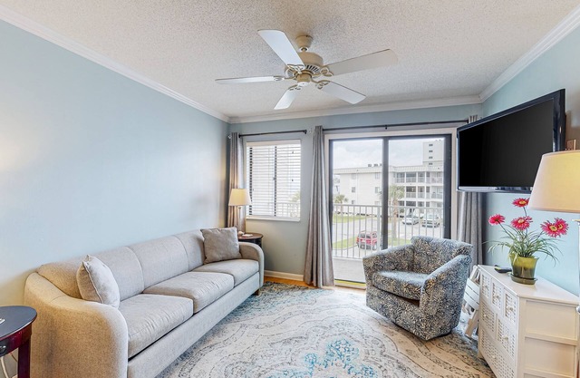 Second-floor ocean view condo with WiFi, shared pools, central AC, & shared W/D