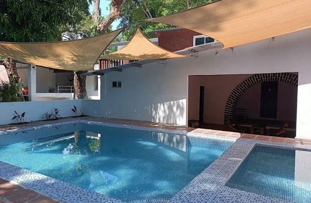 Secret Spot Surf Inn - Quadruple room in Sunzal