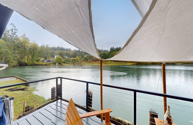 Serene waterfront home with gorgeous deck & views of the cove/mountains