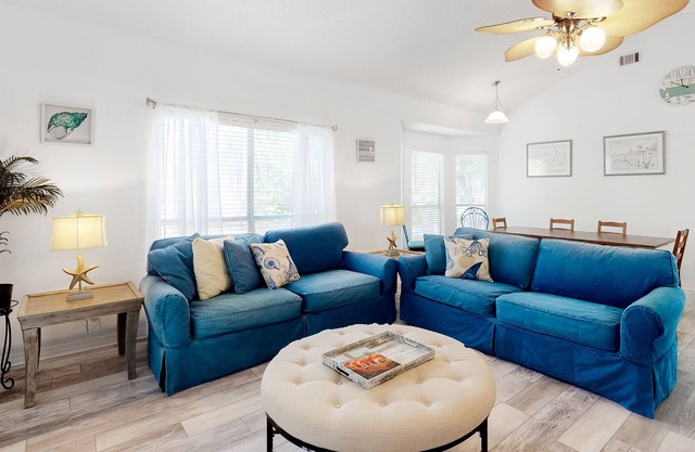 Single-level home near beaches with a washer/dryer & central AC plus pool access