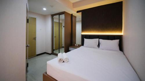 Spacious 2BR Combine Unit at Bale Hinggil Apartment By Travelio