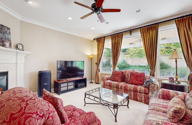 Spacious getaway home with fireplace, private patio & grill