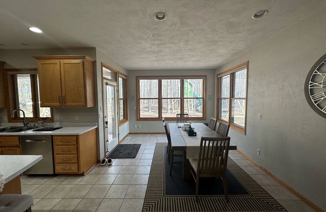 Spacious home with backyard, shuffle board, outdoor play area