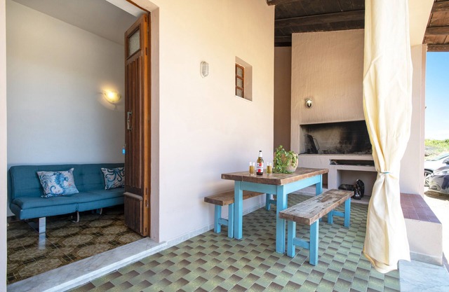 Spacious House in Costa Rossa with Partial Sea View and Terrace