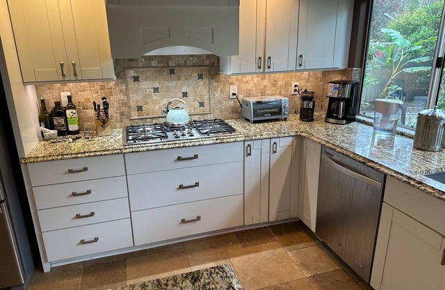 Spacious upscale four bedroom home with gourmet kitchen, Den, and game loft.