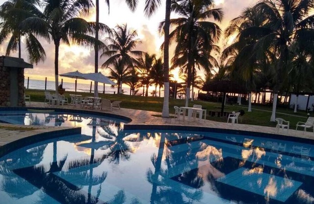 Spend your vacation in front of a private beach with lush recreation area