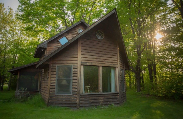 Spiral Staircase Leads To The Lofted Bedroom And Overlooks The Birch Woods.