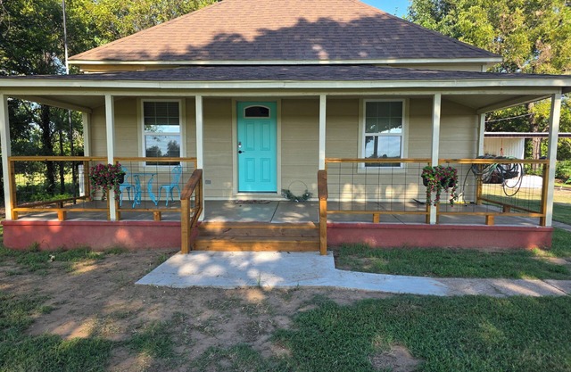 Step back in time with modern comfort in this beautifully preserved 1915 home.