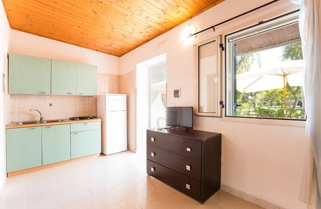 Studio 'Baia Falcone-Comfort Studio 206' with sea view, Wi-Fi and air conditioning