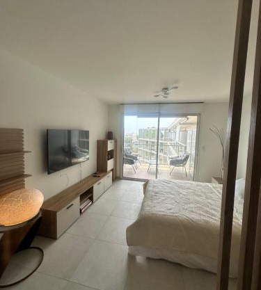 Studio en bord de mer avec piscine sur le toit